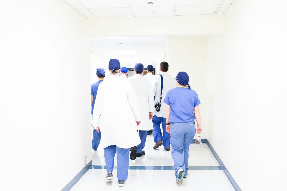 Doctors walking down a hospital corridor